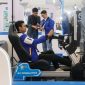 Pengunjung merasakan sensasi mengendarai mobil listrik lewat Simulator Game Berkendara Mobil Listrik di GIIAS Semarang 2025